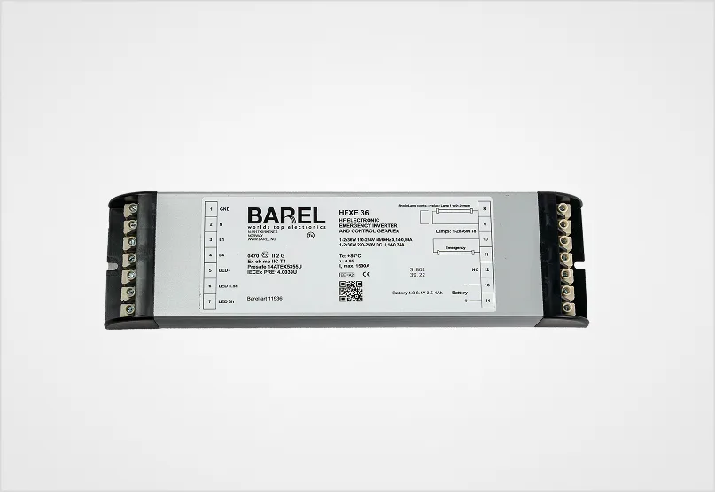 An electronic ballast or inverter, BAREL HFXE LED BG1, for emergency lighting with various electrical connections and product information visible on its surface.
