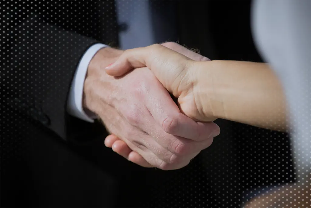 Hand shaking between male and female